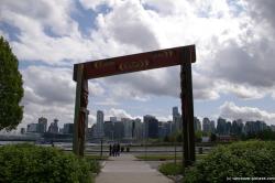 Wooden Native American style gate at Stanley Park.jpg