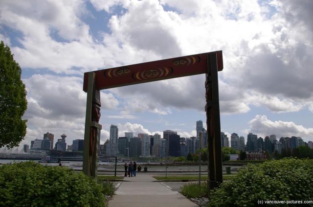 Wooden Native American style gate at Stanley Park.jpg